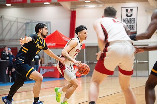 Mike Sudoma/Winnipeg Free Press
Winnipeg Wesmen guard Paul Fransisco looks for a pass while his team takes on the Brandon University Bobcats at the Duckworth centre Saturday
February 17, 2023 