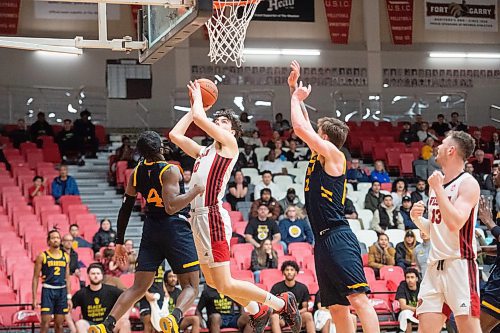 Mike Sudoma/Winnipeg Free Press
Winnipeg Wesmen forward Ryan Luke goes up for a layup while his team takes on the Brandon University Bobcats at the Duckworth centre Saturday
February 17, 2023 