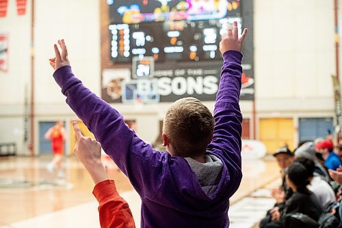 Mike Sudoma/Winnipeg Free Press
A young University of Manitoba Bisons fan cheers after the bisons scored a three pointer as they play the Dinos Investors Group Athletics Centre Saturday evening
February 18, 2023 