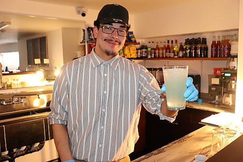 Brennan Myran whips up a virgin margarita at Club 1202, Brandon's first sober bar, this past Saturday night. This dry establishment has been operating since January and is being run by members of the Community Health and Housing Association and the Building Re-Fit Store. (Kyle Darbyson/The Brandon Sun)