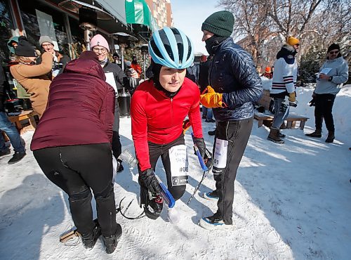 JOHN WOODS / WINNIPEG FREE PRESS
Aggie Gigiel of team Chafing The Dream starts her leg of the team skate relay race at the Beer Can Olympics outside the Gas Station Theatre in Osborne Village in Winnipeg, Sunday, February 19, 2023. 

Re: ?