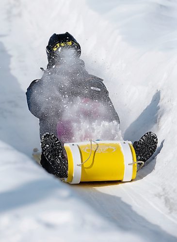 JOHN WOODS / WINNIPEG FREE PRESS
Carman Huang and his daughter Junning slide down a toboggan run at the Festival du Voyageur in Winnipeg, Sunday, February 19, 2023. 

Re: pindera