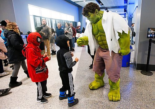 JOHN WOODS / WINNIPEG FREE PRESS
Dhyan, left and brother Jovan (did not want last names used) met up with The Hulk during Super Hero Day at the Manitoba Moose versus Grand Rapids Griffins AHL game in Winnipeg on Monday, February 20, 2023.

Reporter: standup