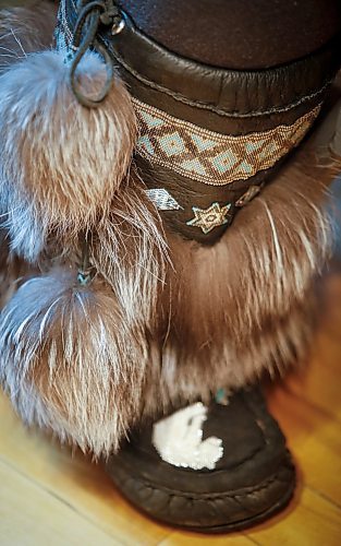 JOHN WOODS / WINNIPEG FREE PRESS
Meghan McLeod shows an example of her beadwork during the Louis Riel Day celebration at the Saint Boniface Museum in Winnipeg, Monday, February 20, 2023.

Reporter: Pindera