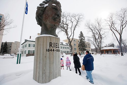 JOHN WOODS / WINNIPEG FREE PRESS
A family visits the Louis Riel statue during the Louis Riel Day celebration at the Saint Boniface Museum in Winnipeg, Monday, February 20, 2023.

Reporter: Pindera