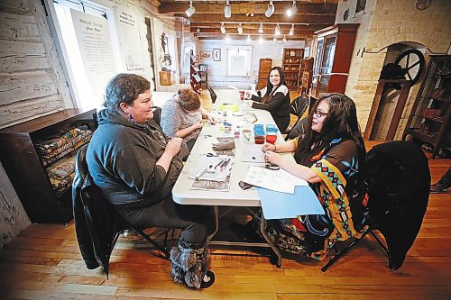 JOHN WOODS / WINNIPEG FREE PRESS
Meghan McLeod, from left, Samantha Silvester, Carly Fenner, Cultural Programming Administrative Coordinator at the Louis Riel Institute and Melanie Richard work on their beading projects during the Louis Riel Day celebration at the Saint Boniface Museum in Winnipeg, Monday, February 20, 2023.

Reporter: Pindera
