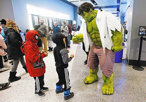 JOHN WOODS / WINNIPEG FREE PRESS
Dhyan, left and brother Jovan (did not want last names used) met up with The Hulk during Super Hero Day at the Manitoba Moose versus Grand Rapids Griffins AHL game in Winnipeg on Monday, February 20, 2023.

Reporter: standup