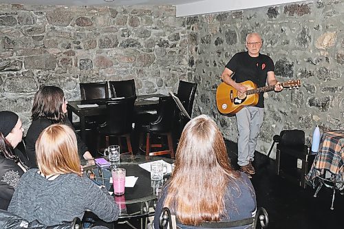Local musician Jan Ek performs a variety of folk, country and rock tunes at Club 1202 this past Saturday night in Brandon. (Kyle Darbyson/The Brandon Sun)