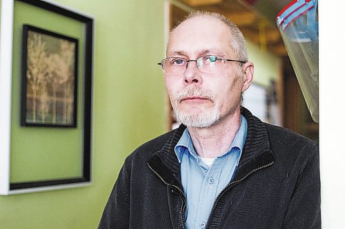 MIKAELA MACKENZIE / WINNIPEG FREE PRESS

Eric De Schepper poses for a photo in his home while caring for his common-law wife, Katherine Ellis, who has pancreatic cancer and has opted for palliative care in Winnipeg on Friday, Feb. 17, 2023. He feels the health care system has failed them, as it took him going to the media to get any support in terms of home care workers. For Kevin story.

Winnipeg Free Press 2023.