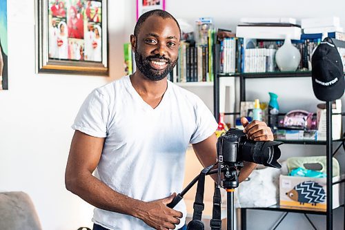 MIKAELA MACKENZIE / WINNIPEG FREE PRESS

Nigerian-Canadian filmmaker Bisong Taiwo, who recently released Mary&#x573; Way of the Cross, poses for a photo in his home in Winnipeg on Tuesday, Feb. 21, 2023. The hour-long film features a black Mary and showcases the interiors and religious artwork of 13 Catholic parishes across the province. For Brenda story.

Winnipeg Free Press 2023.