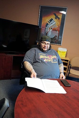 Dale Turcotte, 42, of Rolling River First Nation, looks through his notes before giving a speech at the community's heath centre on how important it is for young people to stay away from the world of drugs. (Miranda Leybourne/The Brandon Sun)