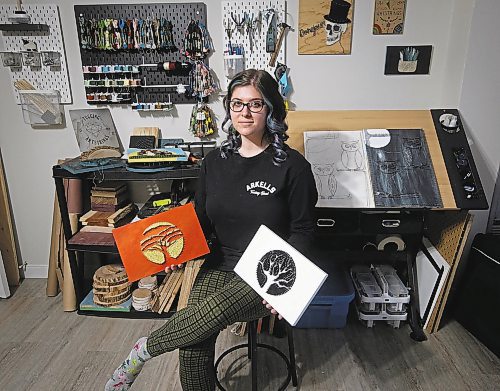 JOHN WOODS / WINNIPEG FREE PRESS
Madison Danu&#x161;ka, owner of Tugging at Your Hear Strings, a home-based venture specializing in string art is photographed in her home studio Winnipeg, Tuesday, February 21, 2023.

Reporter: Sanderson