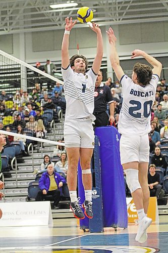JJ Love sets Paycen Warkentin during the a Bobcats men's volleyball match earlier this season. Warkentin may return from a four-match absence for today's quarterfinal match at Trinity Western. (Thomas Friesen/The Brandon Sun)