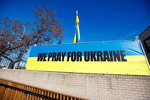 MIKE DEAL / WINNIPEG FREE PRESS
A large sign outside of Holy Family Home, 165 Aberdeen Avenue, declares its support for Ukraine.
230222 - Wednesday, February 22, 2023.