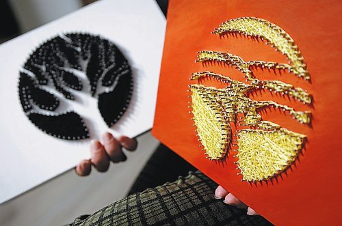 JOHN WOODS / WINNIPEG FREE PRESS
Madison Danu&#x161;ka, owner of Tugging at Your Hear Strings, a home-based venture specializing in string art is photographed in her home studio Winnipeg, Tuesday, February 21, 2023.

Reporter: Sanderson