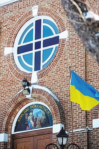 MIKE DEAL / WINNIPEG FREE PRESS
A Ukrainian flag flies outside of Saint Mary the Protectress Ukrainian Orthodox Cathedral, 820 Burrows Avenue.
230222 - Wednesday, February 22, 2023.