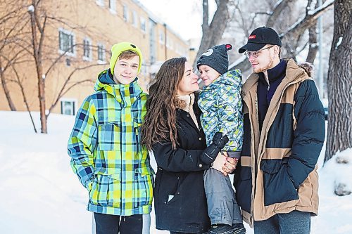 MIKAELA MACKENZIE / WINNIPEG FREE PRESS

Olisya Chychkevych and her sons, Bohdan (15, left), Danylo (four), and Nazariy (22) pose for a photo outside of their apartment building in Winnipeg on Wednesday, Feb. 22, 2023. They came to Winnipeg from Lviv, Ukraine in August. For Brenda story.

Winnipeg Free Press 2023.