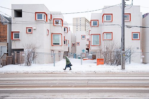 Mike Sudoma/Winnipeg Free Press
A pedestrian walks by a Manitoba Housing complex located at 575 Balmoral St Thursday afternoon
February 23, 2023 