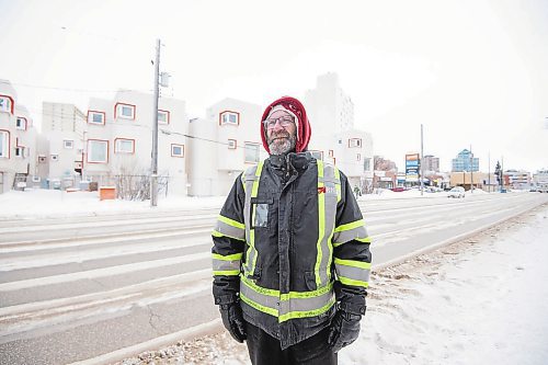 Mike Sudoma/Winnipeg Free Press
Long time West End resident Jason Keenan stands in front of a Manitoba Housing complex located at 575 Balmoral St Thursday afternoon
February 23, 2023 