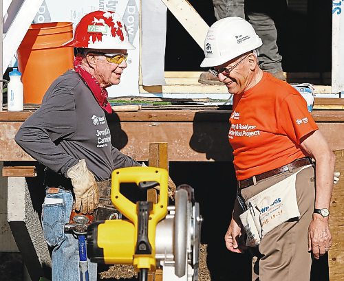 WAYNE GLOWACKI / WINNIPEG FREE PRESS



At right, LeRoy Troyer, the house lead on former President Jimmy Carter's house who is standing at left. Originally from Indiana, he's a close friend of the Carters who has been working on their Habitat builds for over 30 years.  Melissa Martin story July 13  2017