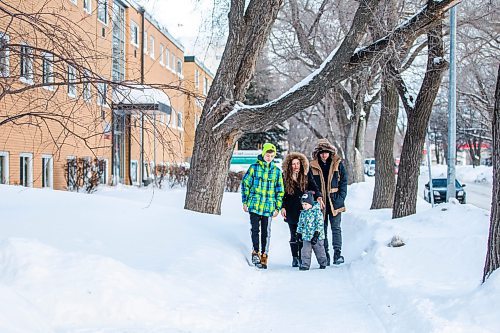 MIKAELA MACKENZIE / WINNIPEG FREE PRESS

Olisya Chychkevych and her sons, Bohdan (15, left), Danylo (four), and Nazariy (22) pose for a photo outside of their apartment building in Winnipeg on Wednesday, Feb. 22, 2023. They came to Winnipeg from Lviv, Ukraine in August. For Brenda story.

Winnipeg Free Press 2023.