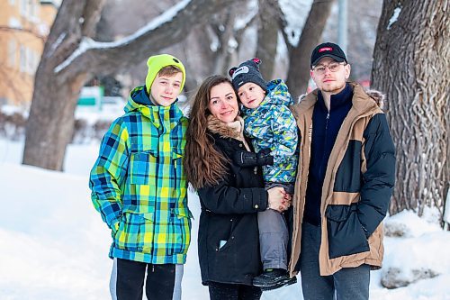 MIKAELA MACKENZIE / WINNIPEG FREE PRESS

Olisya Chychkevych and her sons, Bohdan (15, left), Danylo (four), and Nazariy (22) pose for a photo outside of their apartment building in Winnipeg on Wednesday, Feb. 22, 2023. They came to Winnipeg from Lviv, Ukraine in August. For Brenda story.

Winnipeg Free Press 2023.