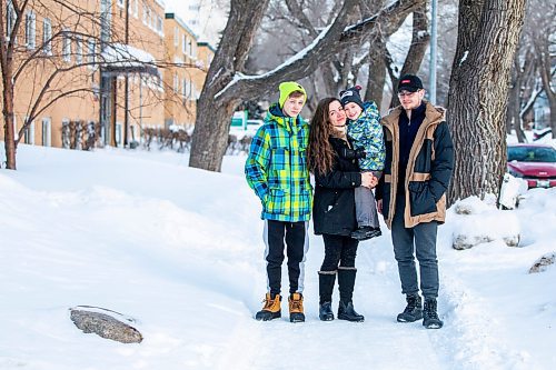 MIKAELA MACKENZIE / WINNIPEG FREE PRESS

Olisya Chychkevych and her sons, Bohdan (15, left), Danylo (four), and Nazariy (22) pose for a photo outside of their apartment building in Winnipeg on Wednesday, Feb. 22, 2023. They came to Winnipeg from Lviv, Ukraine in August. For Brenda story.

Winnipeg Free Press 2023.