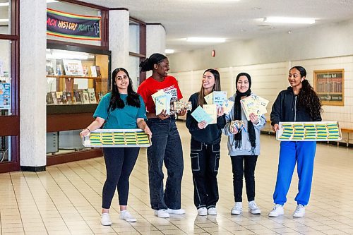 MIKAELA MACKENZIE / WINNIPEG FREE PRESS

Youth Community students Harleen Brar (left), Elizabeth Oguntola, Nancy Pham, Nigha Haq, and Rose Woldemariam pose for a photo with items that will go into the packages they are making for Ukrainian newcomers at Kildonan-East Collegiate in Winnipeg on Wednesday, Feb. 22, 2023. For &#x460;story.

Winnipeg Free Press 2023.