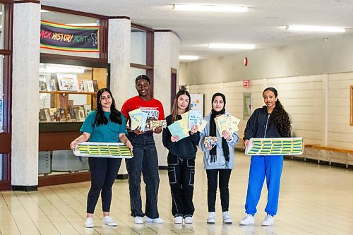 MIKAELA MACKENZIE / WINNIPEG FREE PRESS

Youth Community students Harleen Brar (left), Elizabeth Oguntola, Nancy Pham, Nigha Haq, and Rose Woldemariam pose for a photo with items that will go into the packages they are making for Ukrainian newcomers at Kildonan-East Collegiate in Winnipeg on Wednesday, Feb. 22, 2023. For &#x460;story.

Winnipeg Free Press 2023.