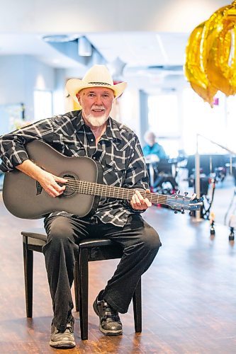 MIKAELA MACKENZIE / WINNIPEG FREE PRESS

Larry Updike poses for a photo before a show at Concordia Village retirement centre in Winnipeg on Friday, Feb. 24, 2023. For John Longhurst story.

Winnipeg Free Press 2023.