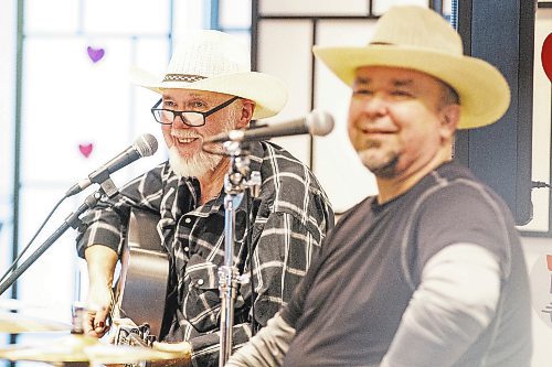 MIKAELA MACKENZIE / WINNIPEG FREE PRESS

Larry Updike (left) and Eric Boorman sing during show at Concordia Village retirement centre in Winnipeg on Friday, Feb. 24, 2023. For John Longhurst story.

Winnipeg Free Press 2023.