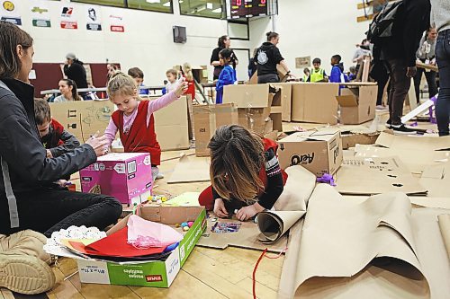 "Play to learn" was the philosophy behind the event, which allowed kids to use their creative skills to design and build structures out of cardboard boxes. (Geena Mortfield/The Brandon Sun)