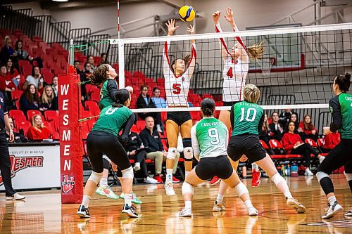 MIKAELA MACKENZIE / WINNIPEG FREE PRESS

U of W Wesmen Selva Planincic (5) and Taylor Kleysen (4) block the ball during a Canada west quarterfinal volleyball game against the Fraser Valley Cascades at the Duckworth Centre in Winnipeg on Friday, Feb. 24, 2023. For Mike story.

Winnipeg Free Press 2023.