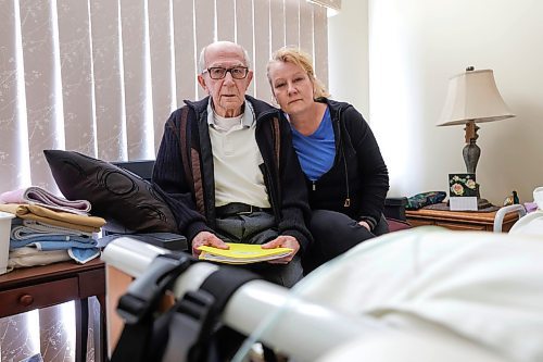 RUTH BONNEVILLE / WINNIPEG FREE PRESS 

LOCAL - Family run home care

Photo of Raymond Duerinckx, 87, and his daughter Michelle Duerinckx, sitting next to their wife and mother who is on palliative care at home for heart failure. 

Story: Raymond Duerinckx, 87, and his daughter Michelle Duerinckx are looking after their wife and mother who is on palliative care at home for heart failure. She will be 90 in a few days. They had to obtain private home care, partly covered out of pocket, because Tannis never got the consistent home care services she needed upon being released from the hospital. The private costs are partially funded under the province's self-management care program, but Raymond spends over $1000 every two weeks to keep the private care. Meanwhile, Michelle cares for her mother all night and works as a home-care worker during the day. 



Feb 24th,  2023