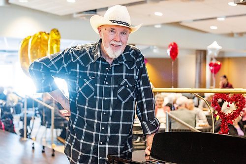 MIKAELA MACKENZIE / WINNIPEG FREE PRESS

Larry Updike poses for a photo before a show at Concordia Village retirement centre in Winnipeg on Friday, Feb. 24, 2023. For John Longhurst story.

Winnipeg Free Press 2023.