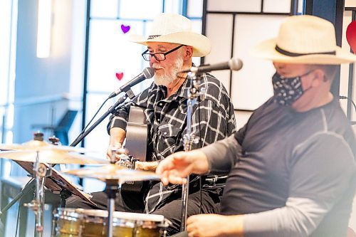 MIKAELA MACKENZIE / WINNIPEG FREE PRESS

Larry Updike (left) and Eric Boorman sing during show at Concordia Village retirement centre in Winnipeg on Friday, Feb. 24, 2023. For John Longhurst story.

Winnipeg Free Press 2023.