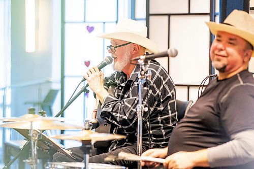 MIKAELA MACKENZIE / WINNIPEG FREE PRESS

Larry Updike (left) and Eric Boorman sing during show at Concordia Village retirement centre in Winnipeg on Friday, Feb. 24, 2023. For John Longhurst story.

Winnipeg Free Press 2023.