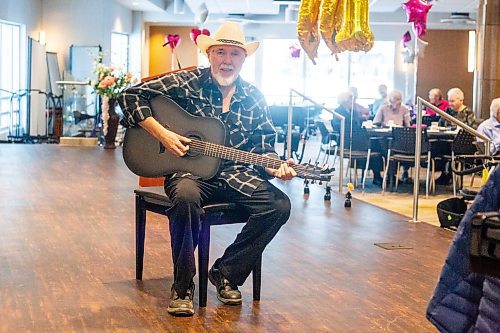 MIKAELA MACKENZIE / WINNIPEG FREE PRESS

Larry Updike poses for a photo before a show at Concordia Village retirement centre in Winnipeg on Friday, Feb. 24, 2023. For John Longhurst story.

Winnipeg Free Press 2023.