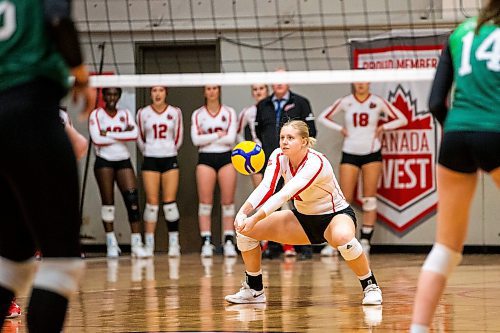 MIKAELA MACKENZIE / WINNIPEG FREE PRESS

U of W Wesmen Emma Parker (9) bumps the ball during a Canada west quarterfinal volleyball game against the Fraser Valley Cascades at the Duckworth Centre in Winnipeg on Friday, Feb. 24, 2023. For Mike story.

Winnipeg Free Press 2023.