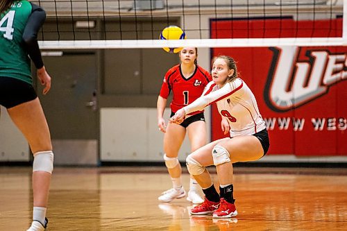 MIKAELA MACKENZIE / WINNIPEG FREE PRESS

U of W Wesmen Emma Parker (9) bumps the ball during a Canada west quarterfinal volleyball game against the Fraser Valley Cascades at the Duckworth Centre in Winnipeg on Friday, Feb. 24, 2023. For Mike story.

Winnipeg Free Press 2023.