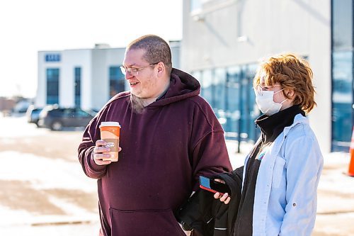 MIKAELA MACKENZIE / WINNIPEG FREE PRESS

Jaimie Orford and his daughter, Amy Orford (11), walk out of the Notre Dame vaccine clinic (the final provincial vaccination site) after getting their shots on its last day open in Winnipeg on Saturday, Feb. 25, 2023. For Malak Abas story.

Winnipeg Free Press 2023.