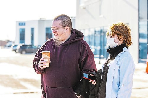 MIKAELA MACKENZIE / WINNIPEG FREE PRESS

Jaimie Orford and his daughter, Amy Orford (11), walk out of the Notre Dame vaccine clinic (the final provincial vaccination site) after getting their shots on its last day open in Winnipeg on Saturday, Feb. 25, 2023. For Malak Abas story.

Winnipeg Free Press 2023.