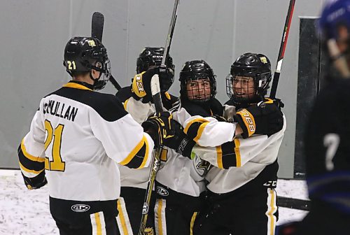 Brandon under-17 AAA Wheat Kings forward Lucas Newman, second from right, celebrates his game-winning goal with Liam Puchailo, right, Loughlan McMullan, left, and an obscured teammate during their 6-3 win over the Interlake Lightning at J&amp;G Homes Arena on Saturday afternoon. (Perry Bergson/The Brandon Sun)