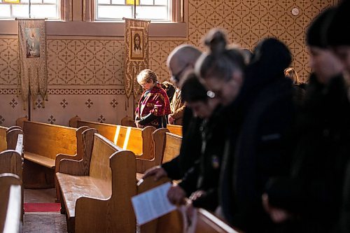 MIKAELA MACKENZIE / WINNIPEG FREE PRESS

People bow their heads during an 11 a.m. prayer service at St. Mary the Protectress Ukrainian Orthodox Cathedral commemorating the one year anniversary of war in the Ukraine in Winnipeg on Saturday, Feb. 25, 2023. For John Longhurst story.

Winnipeg Free Press 2023.