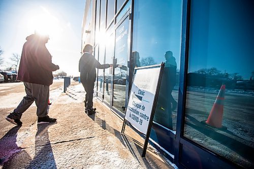 MIKAELA MACKENZIE / WINNIPEG FREE PRESS

Jaimie Orford and his daughter, Amy Orford (11), walk into the Notre Dame vaccine clinic (the final provincial vaccination site) on its last day open in Winnipeg on Saturday, Feb. 25, 2023. For Malak Abas story.

Winnipeg Free Press 2023.