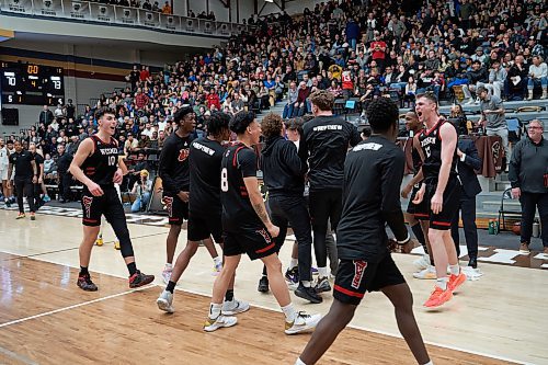DAVID LIPNOWSKI / WINNIPEG FREE PRESS

The Winnipeg Wesmen celebrate beating the Manitoba Bisons 73-70 during the Canada West Final Four Semi Finals Saturday February 25, 2023 at Investors Group Athletic Centre.