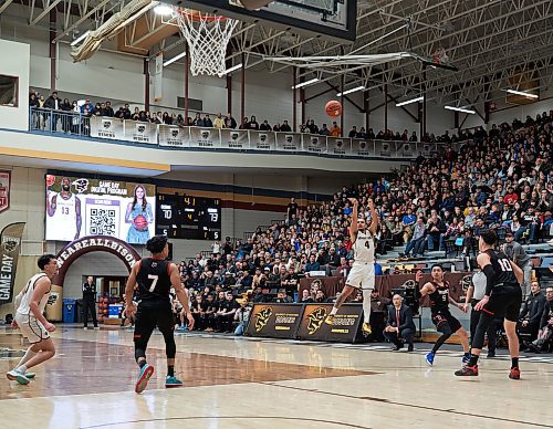 DAVID LIPNOWSKI / WINNIPEG FREE PRESS

Manitoba Bisons #4 Elijah Lostracco puts up a shot against the Winnipeg Wesmen, who ultimately won 73-70 during the Canada West Final Four Semi Finals Saturday February 25, 2023 at Investors Group Athletic Centre.