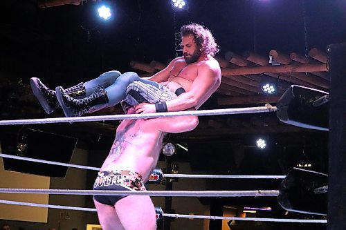 Tyler Colton executes a devastating powerbomb on Cloud 9 Wrestling Heavyweight Championship Tommy Lee Curtis during the main event of Saturday's show at The Great Western Roadhouse in Brandon. (Kyle Darbyson/The Brandon Sun)
