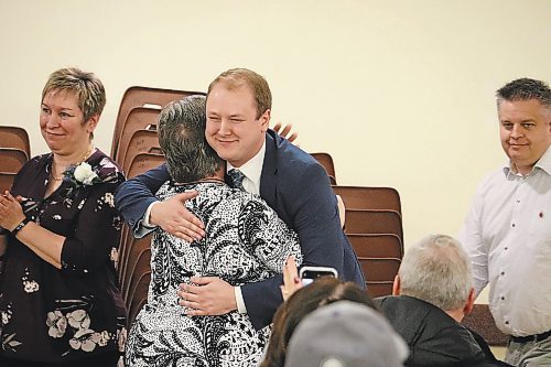 Grant Jackson hugs one of his supporters Saturday afternoon at the Wawanesa and District Community Hall after the results of Saturday's candidacy election for the riding of Spruce Woods were revealed. (Kyle Darbyson/The Brandon Sun)