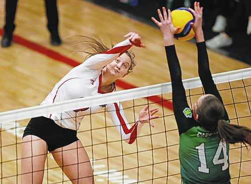 JOHN WOODS / WINNIPEG FREE PRESS
University of Winnipeg Wesmen&#x2019;s Emma Parker (9) goes up for the spike against Fraser Valley Cascades&#x2019; Natalie Lemoine-Sells (14) in the third round of the Canada West quarter-final series Sunday, February 26, 2023. 

Re: sawatzky